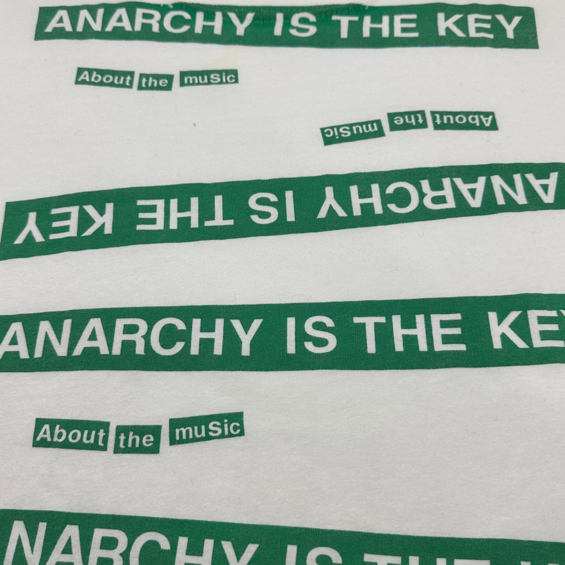 UNDERCOVER(アンダーカバー) 90's Pink Tag ANARCHY IS THE KEY Printed T-Shirt 90年代 ピンクタグ アナーキー イズ ザ キー プリント Tシャツ M ホワイト×グリーン ピンクタグ 初期 稀少品 Anarchy is the key about the music