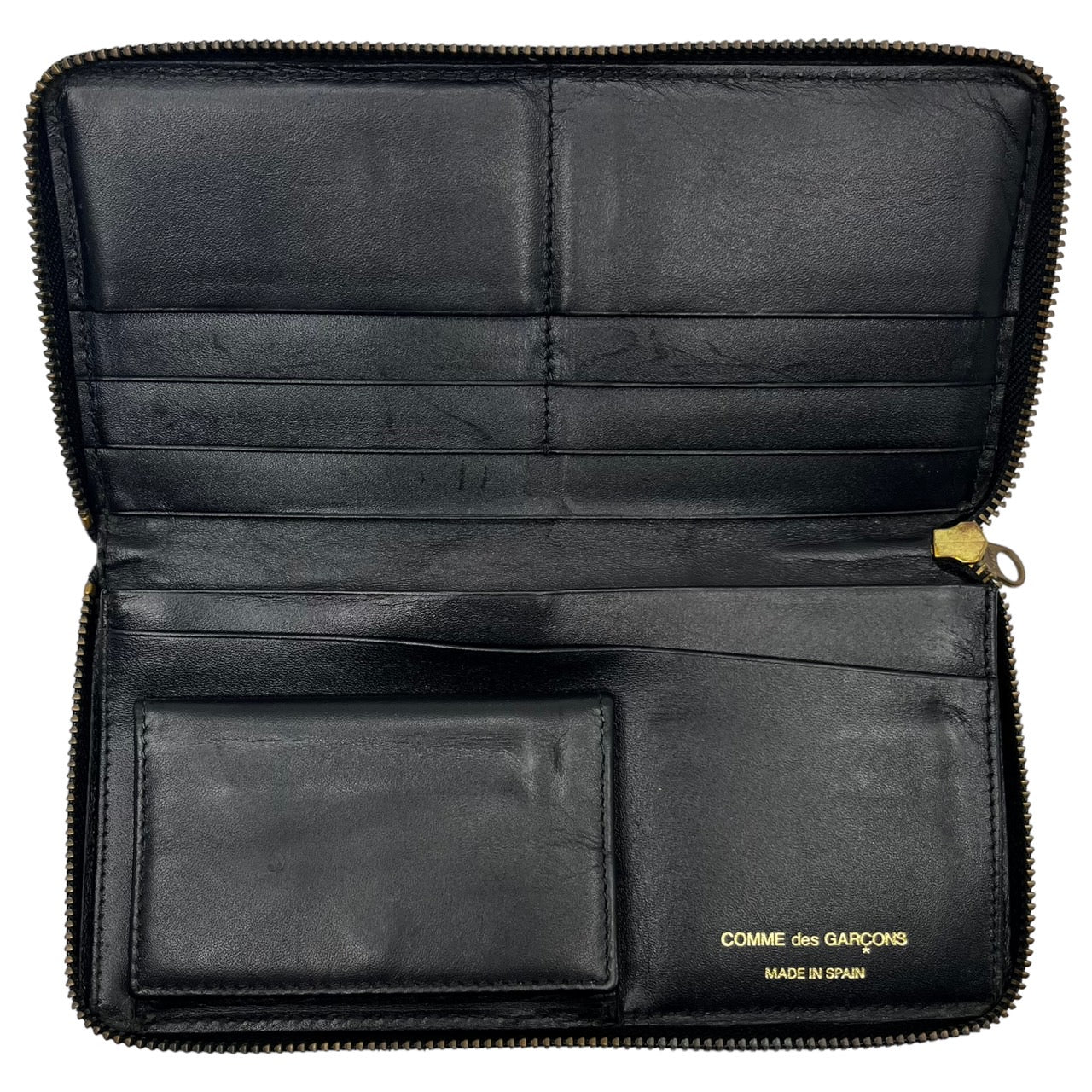 COMME des GARCONS(コムデギャルソン) ラウンドファスナードットウォレット/長財布/水玉 ブラック×ホワイト スペイン製