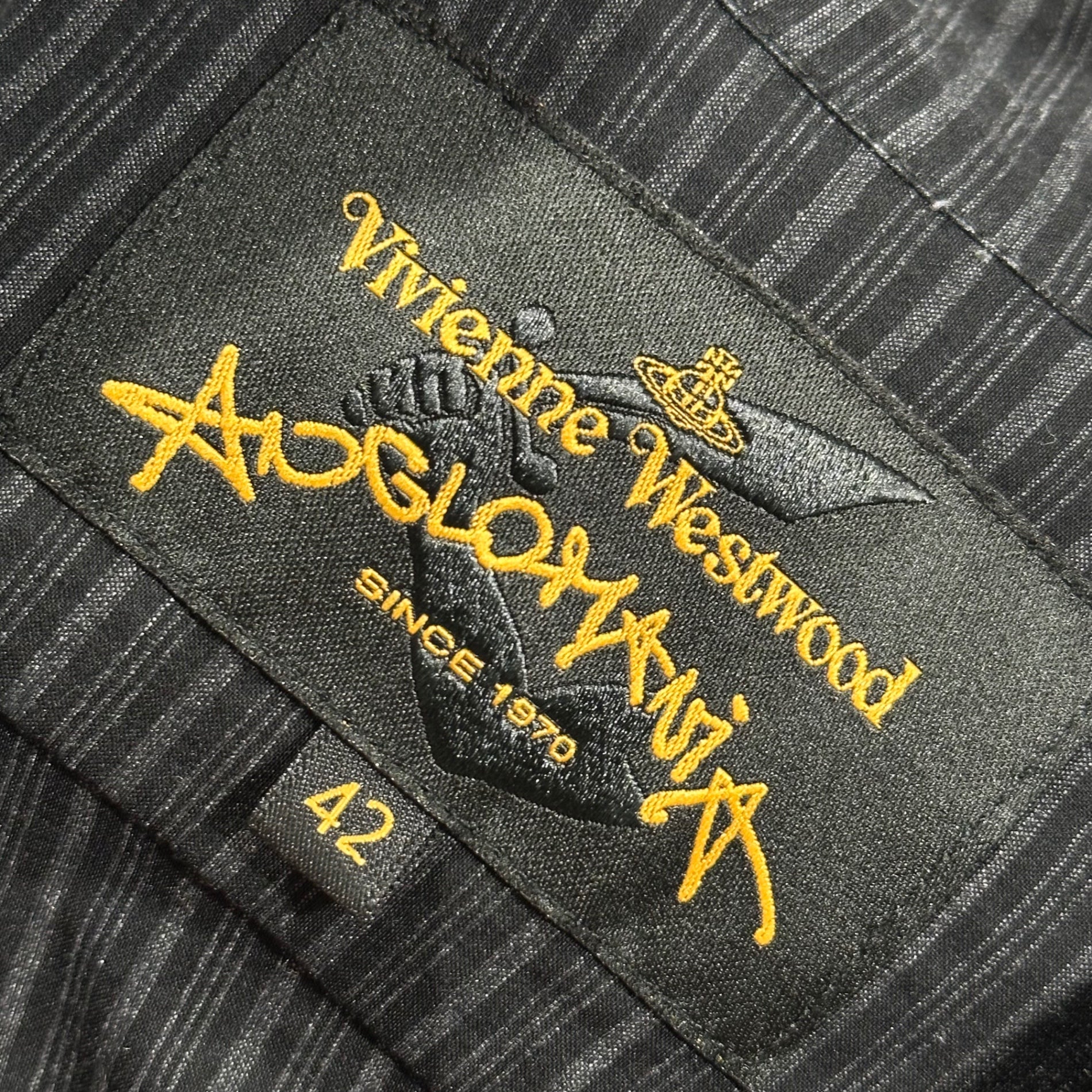 Vivienne Westwood ANGLOMANIA(ヴィヴィアンウエストウッドアングロマニア) Wavy silhouette long shirt dress 歪み うねり ロング ストライプ シャツ ワンピース 14-03-572013 42 ブラック