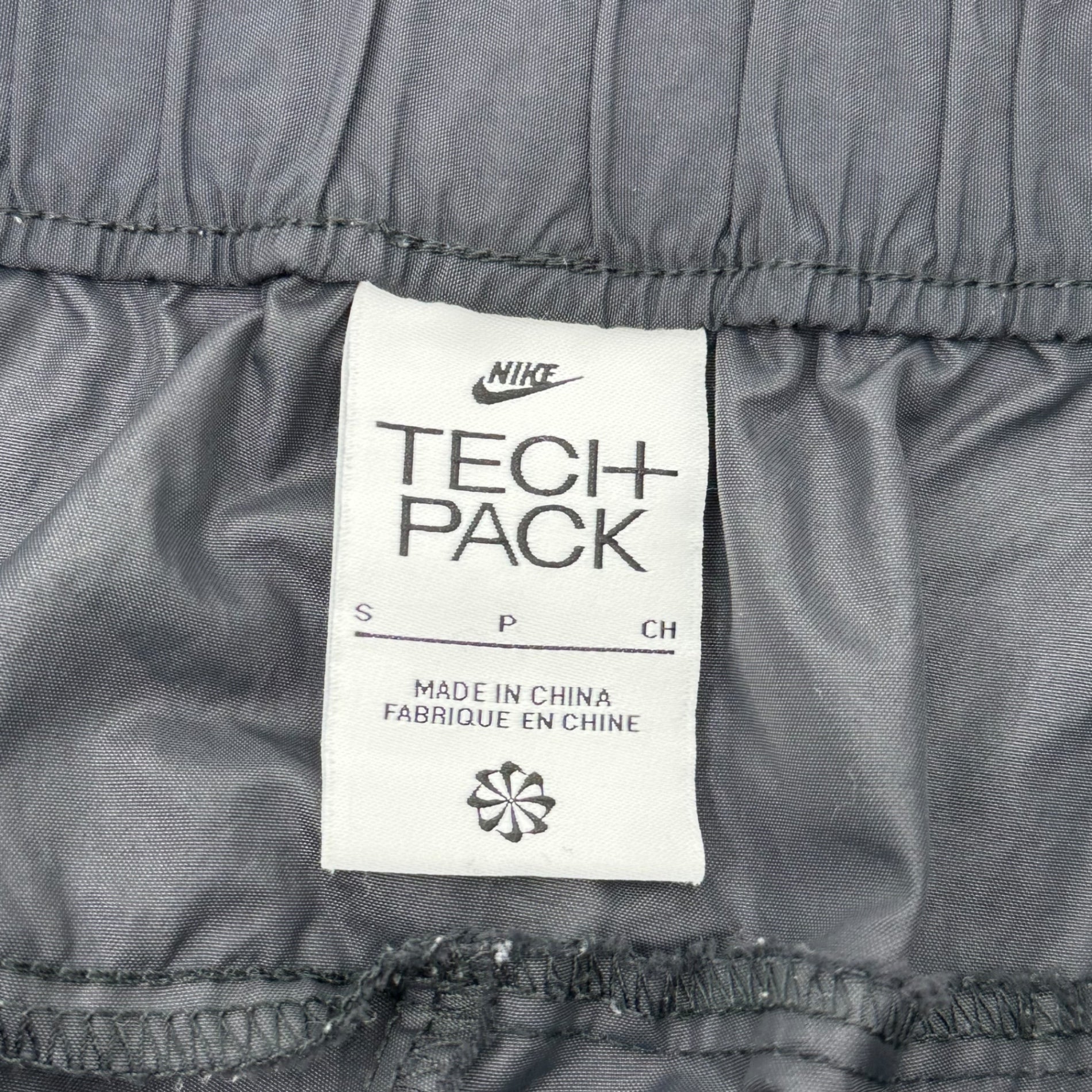 NIKE(ナイキ) NSW TECH PACK WOVEN テックパック ウーブン ナイロン パンツ DM5539-010 S ブラック ジョガー