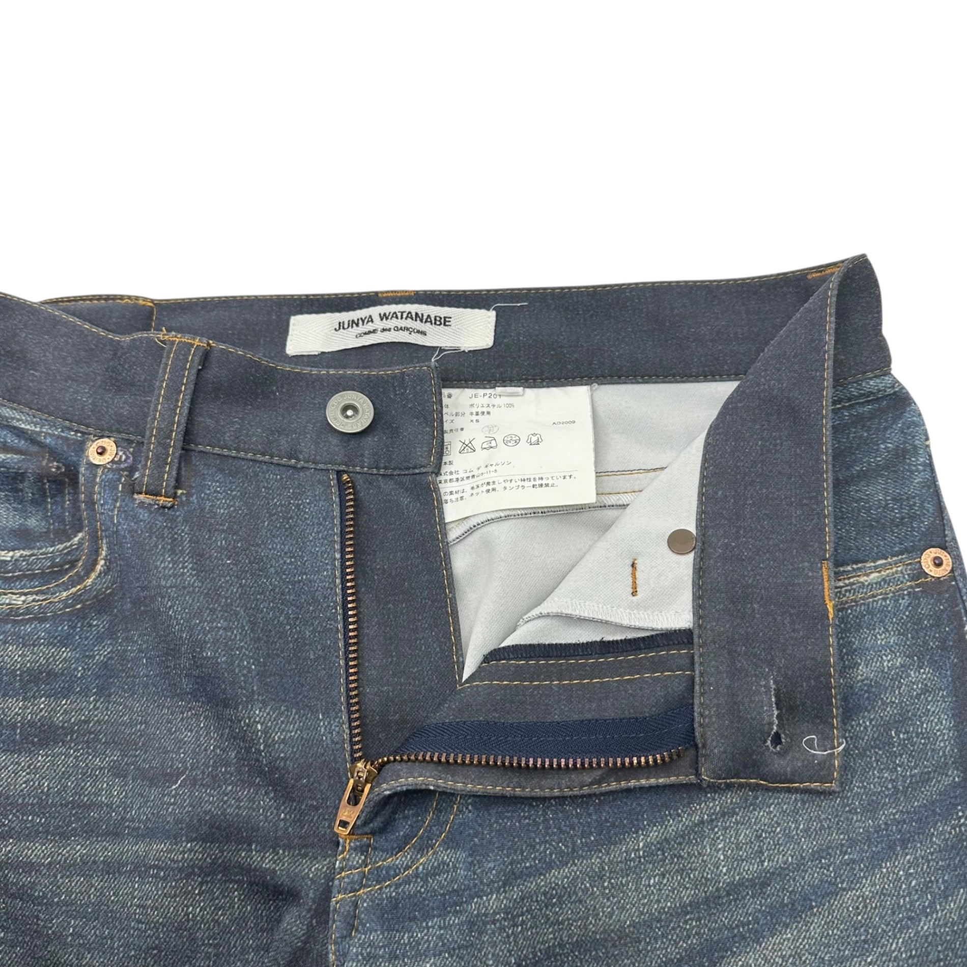 COMME des GARCONS JUNYA WATANABE(コムデギャルソンジュンヤワタナベ) 10SS Distressed denim transfer slim pants ダメージ 加工 デニム 転写 スリム パンツ JE-P201 XS インディゴ AD2009