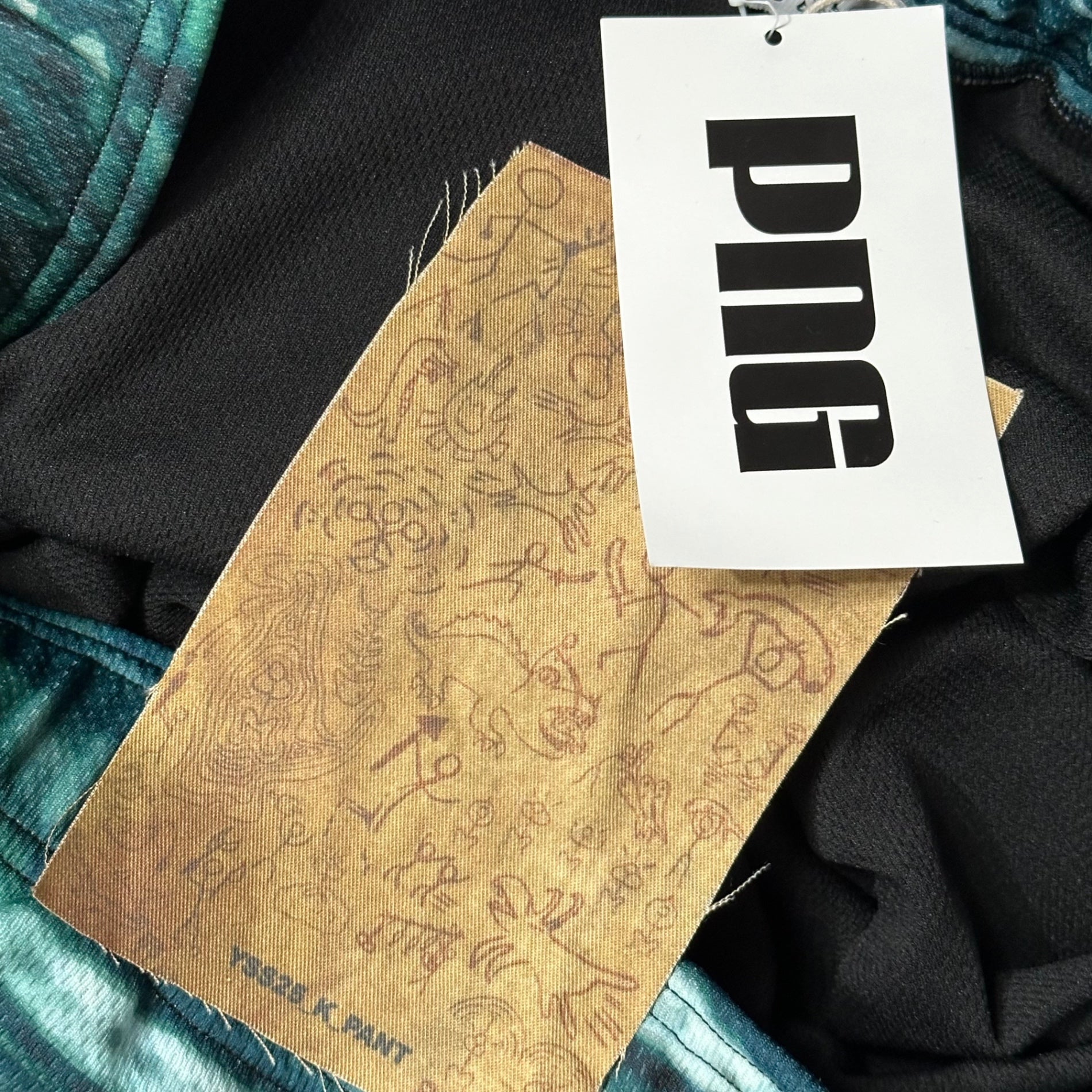 YAKU(ヤク) 2025SS MORPHOSIS PANTS 総柄 ワイド トラック パンツ M グリーン PNG STORE 取扱