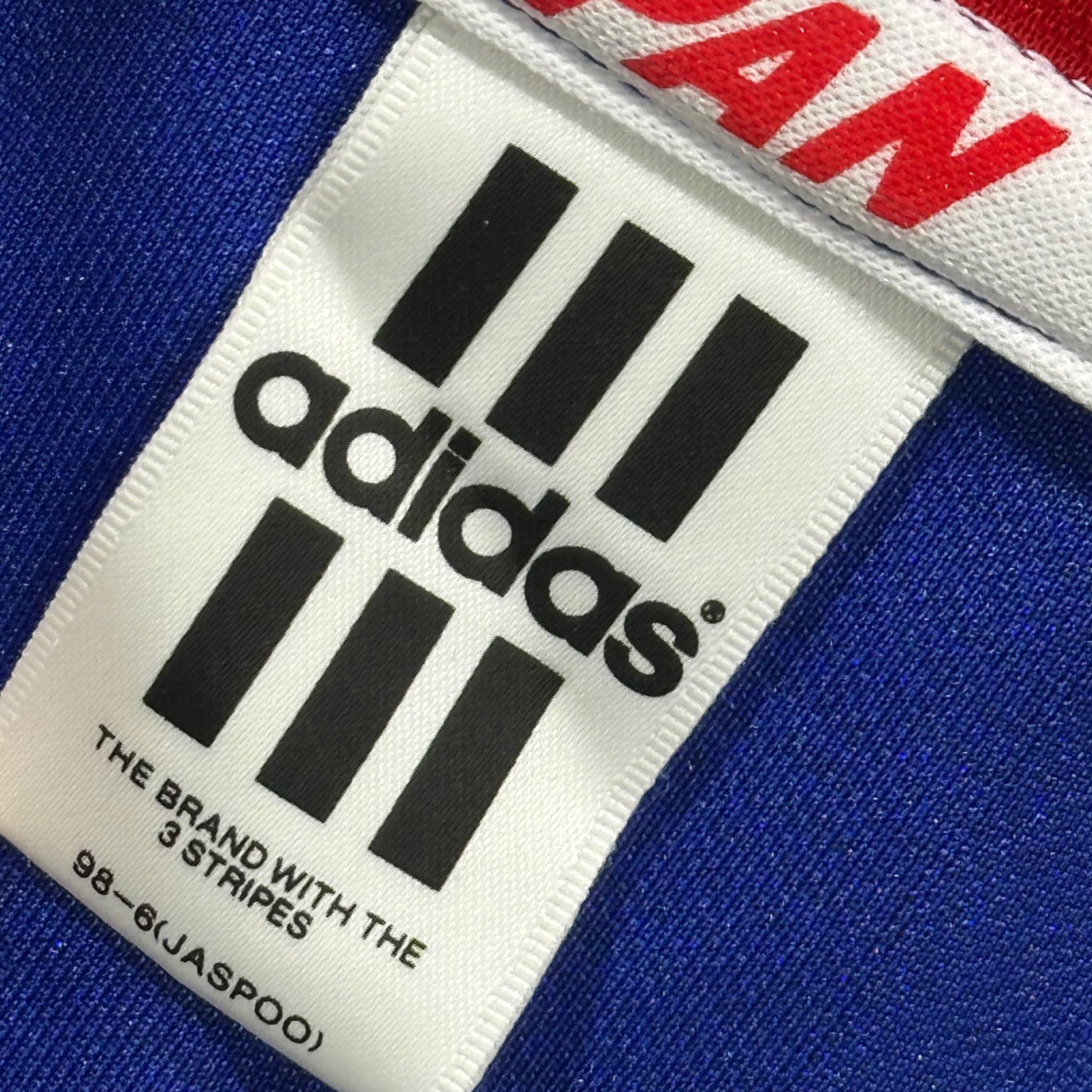 adidas(アディダス) The Joy of Johor Bahru: 1997–98 France World Cup Japan National Team Jersey ジョホールバルの歓喜 97年-98年 フランス ワールドカップ 日本代表 ジャージ AQ-2731 JASPO O トリコロール ファイヤーパターン デサント社製 トラックジャケット レプリカ品