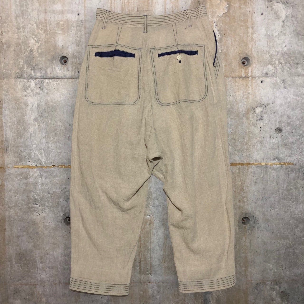 COMME des GARCONS JUNYA WATANABE(コムデギャルソンジュンヤワタナベ) 1タックテーパードリネンパンツ サイズ表記切れ ベージュ×パープル 品質表示タグ切り取り