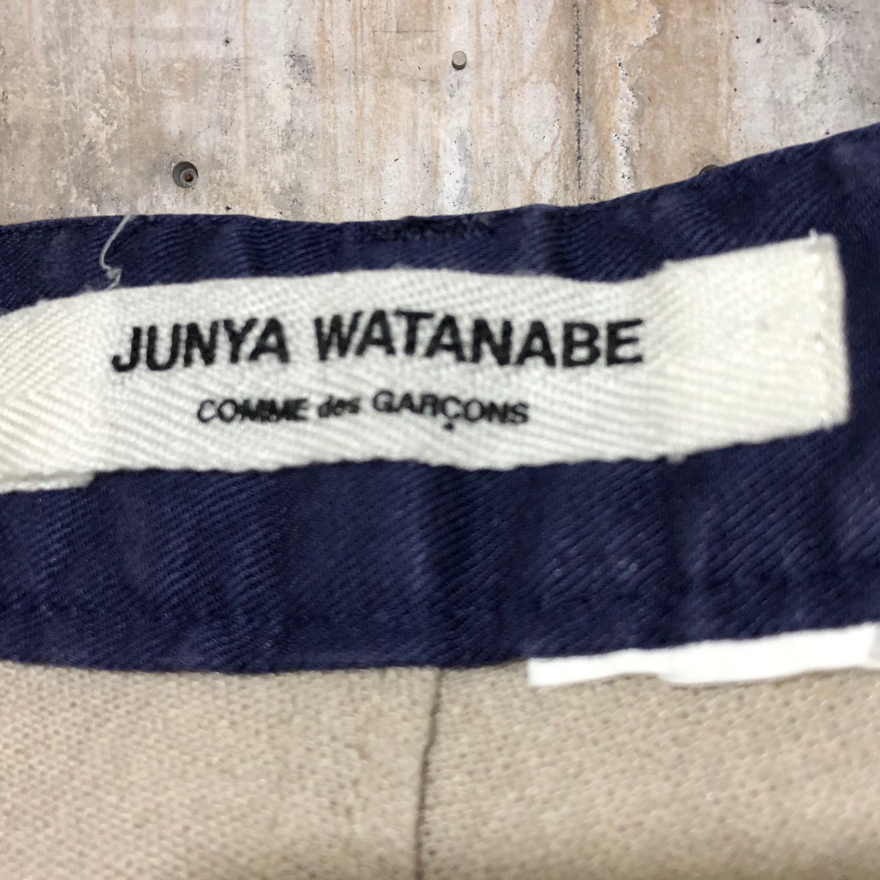 COMME des GARCONS JUNYA WATANABE(コムデギャルソンジュンヤワタナベ) 1タックテーパードリネンパンツ サイズ表記切れ ベージュ×パープル 品質表示タグ切り取り