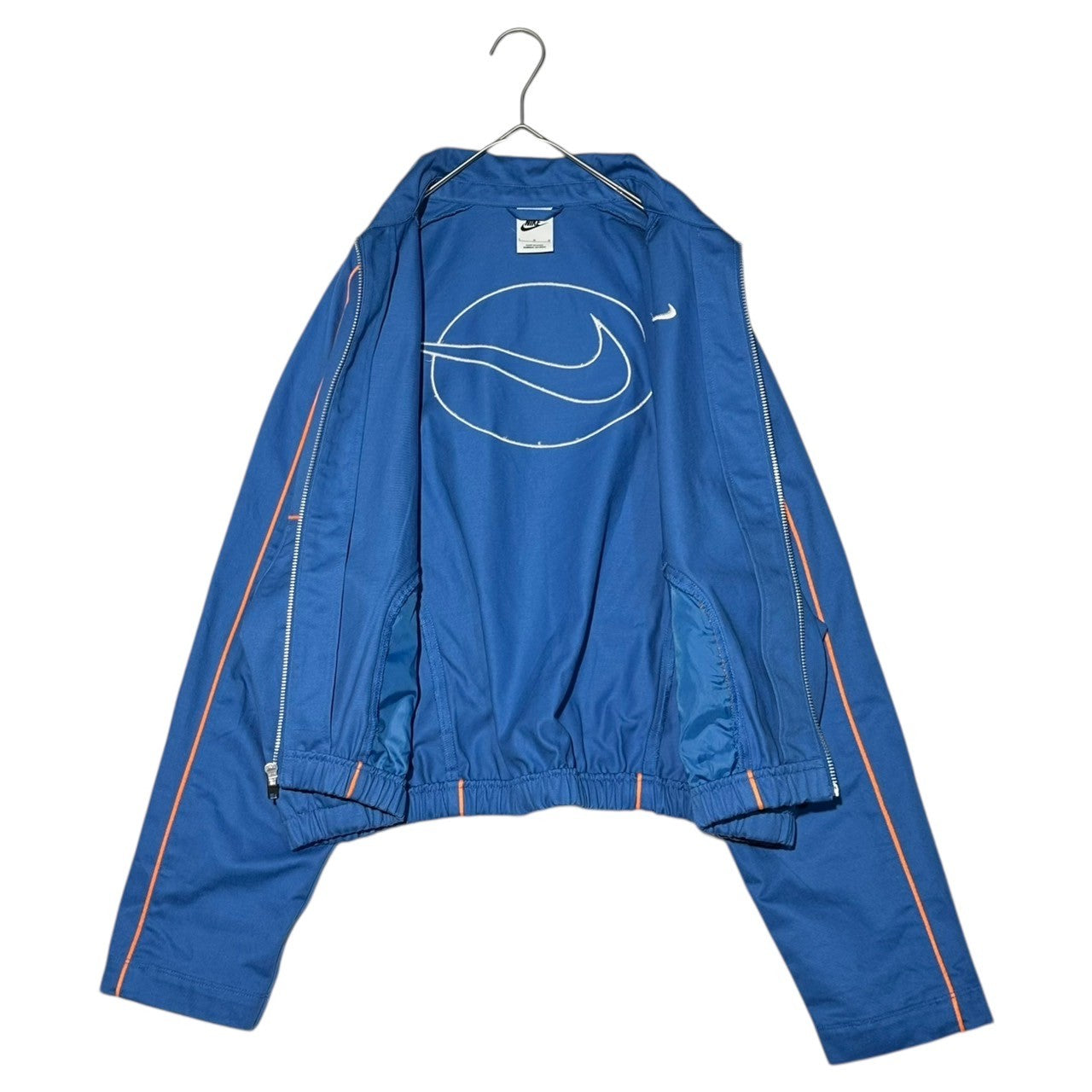 NIKE(ナイキ) AS W NSW STREET WVN JKT STAR BLUE バッグ スウッシュ ロゴ 刺繍 ショート丈 ブルゾン FN1941-402 L ブルー×オレンジ ジャケット