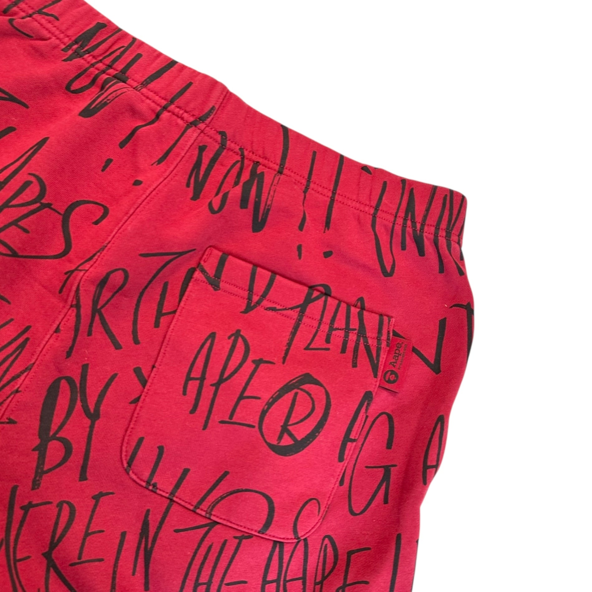 AAPE BY A BATHING APE(エーエイプバイアベイシングエイプ)   All-over print sweatpants 総柄 スウェット パンツ AAPPTM6796XXH M レッド