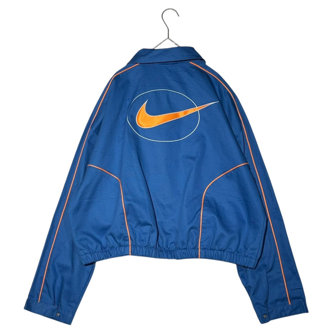NIKE(ナイキ) AS W NSW STREET WVN JKT STAR BLUE バッグ スウッシュ ロゴ 刺繍 ショート丈 ブルゾン FN1941-402 L ブルー×オレンジ ジャケット