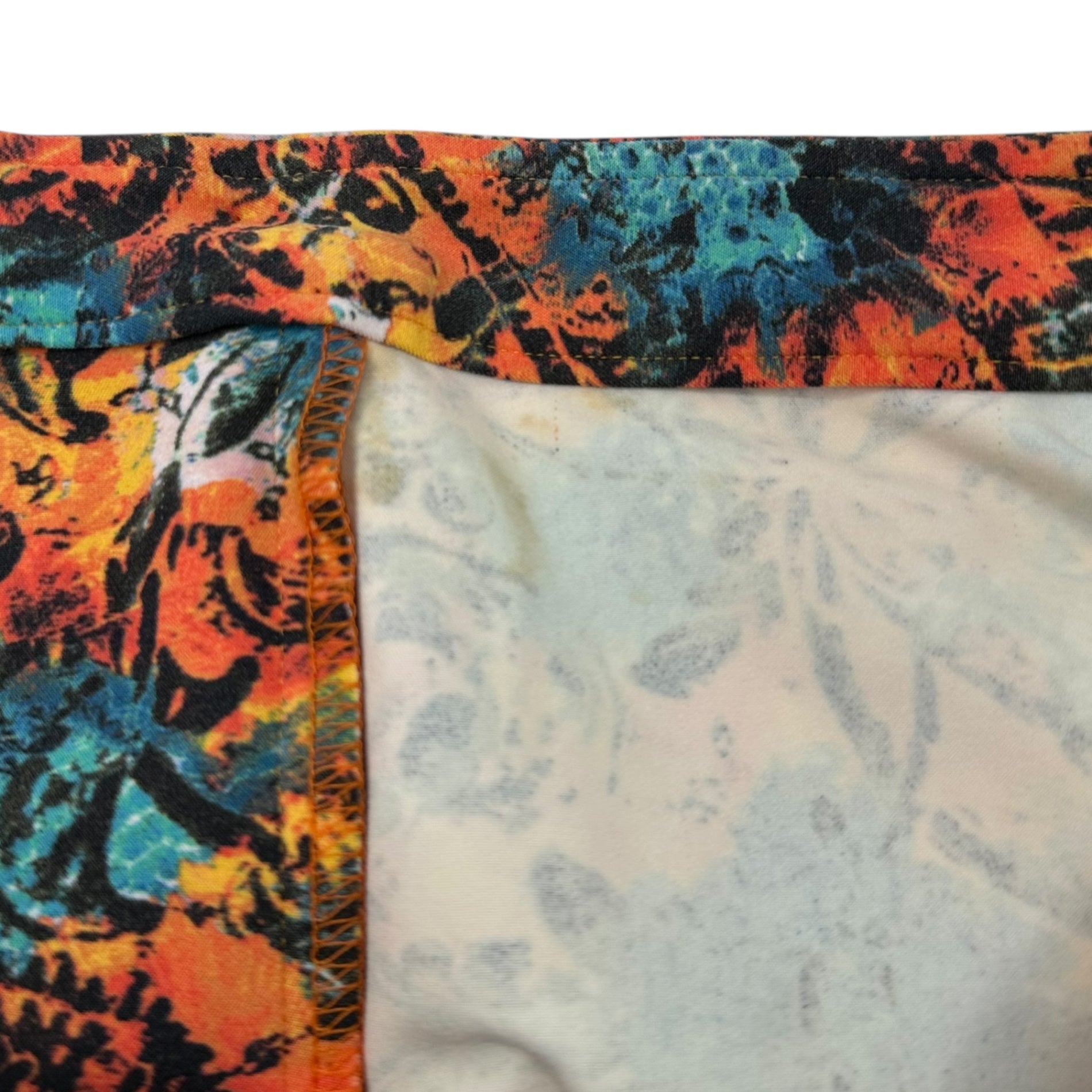 ISSEY MIYAKE(イッセイミヤケ) All-over print stretch pants オレンジ×ブルー