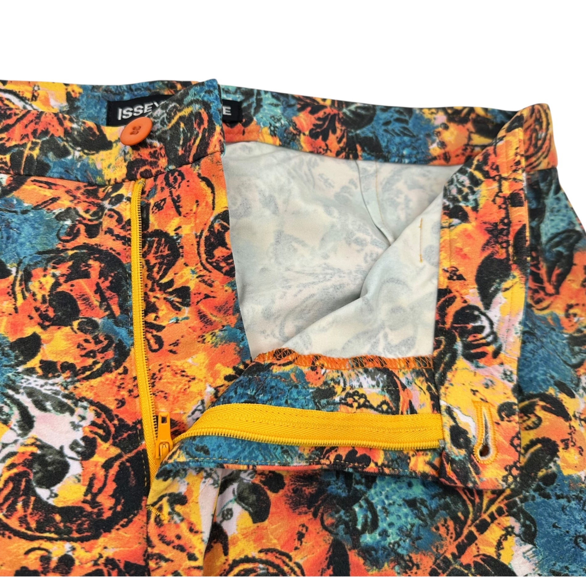 ISSEY MIYAKE(イッセイミヤケ) All-over print stretch pants オレンジ×ブルー