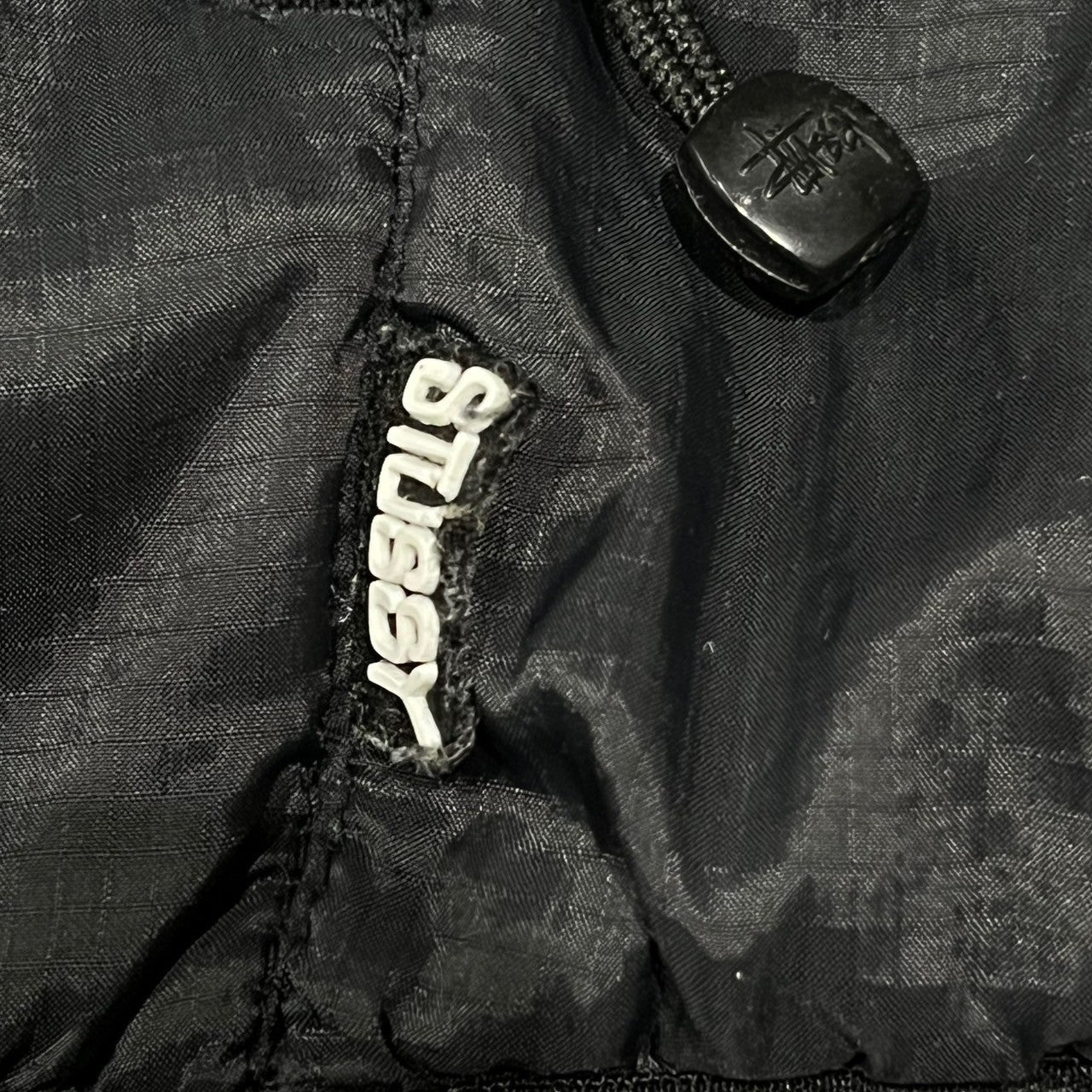 STUSSY(ステューシー) 00's "THERMOLITE"reversible logo jacket 筆記体 ロゴ  総柄 中綿 リバーシブル ジャケット  SIZE M ブラック×ブラック Y2K THERMOLITE 使用