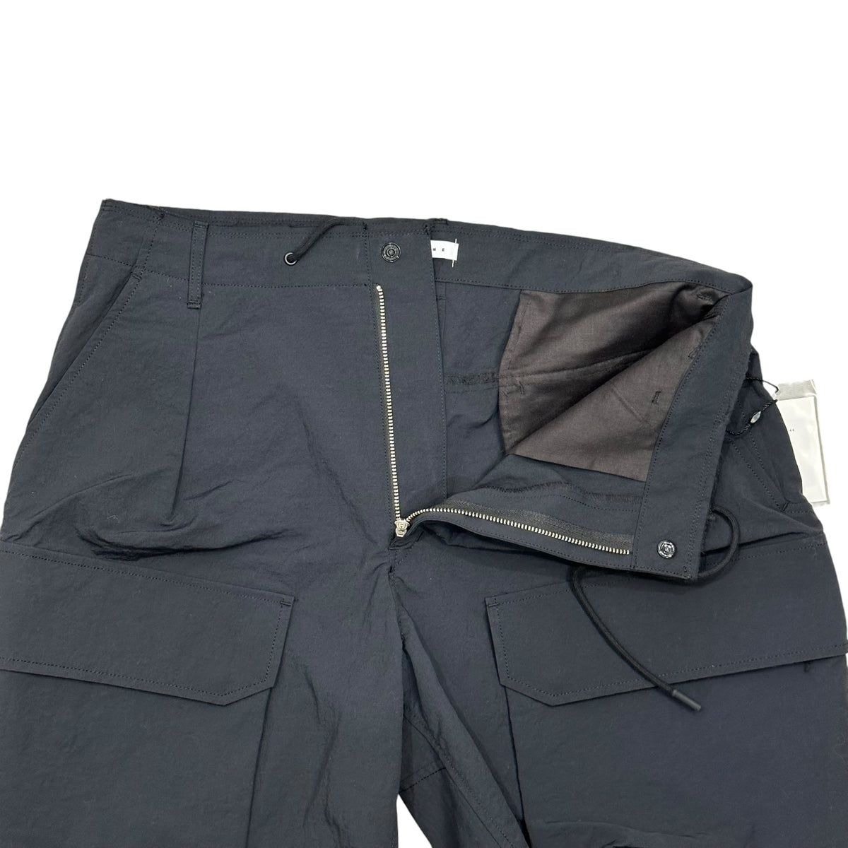Name.(ネーム) 2026SS NYLON TWILL ONE TUCK CARGO SHORTS : TELE CUT ナイロン ツイル 1タック カーゴ ショーツ NMPT-044 1 ブラック ハーフ ショート パンツ