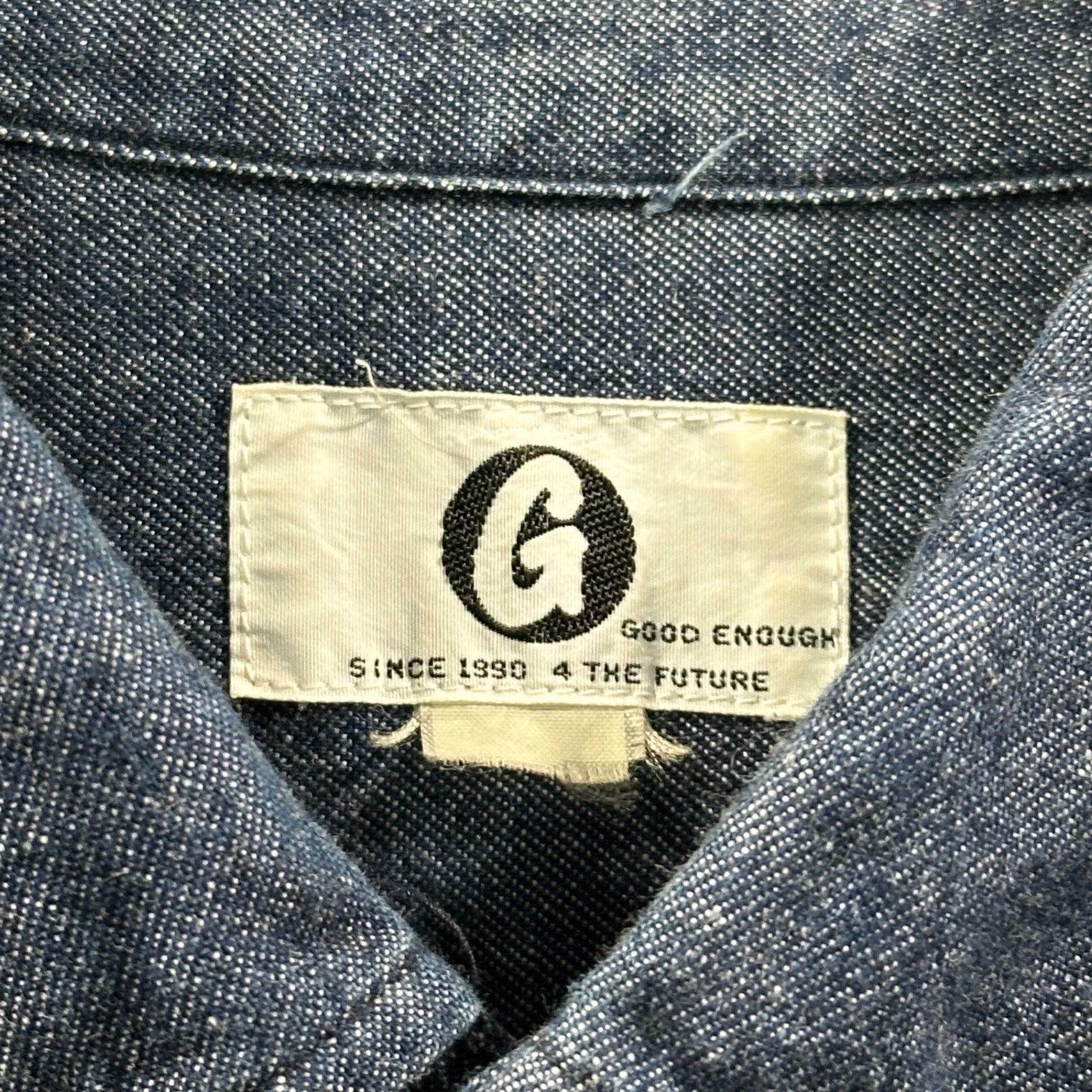 GOODENOUGH(グッドイナフ) 90's Chambray BD Sleeve Logo Shirt シャンブレー 袖ロゴ ボタンダウン シャツ 表記無(L程度) インディゴ