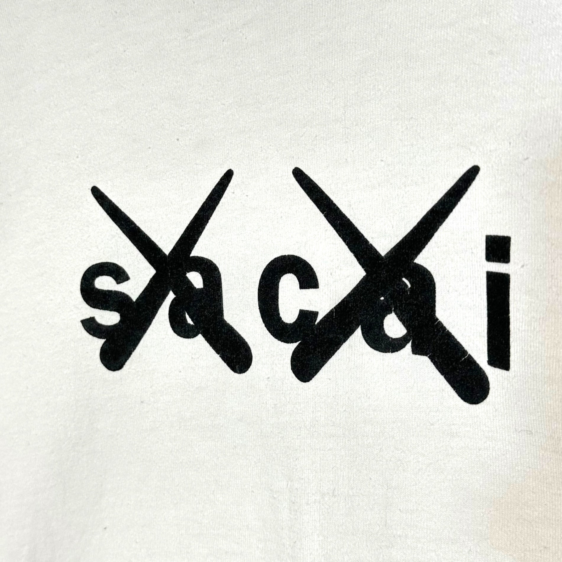 sacai×kaws(サカイ×カウズ) 21SS Long Sleeve T-Shirt ロゴ 長袖 レイヤード Tシャツ 21-0287S 3 ホワイト コラボ