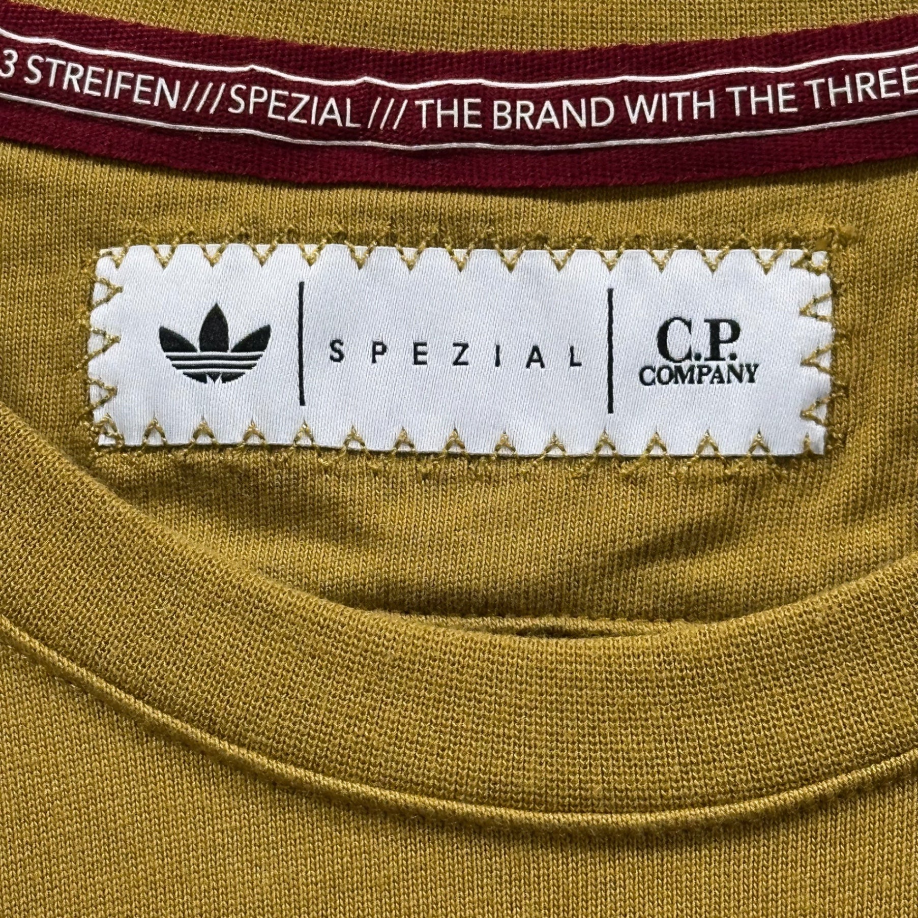 C.P. Company x adidas(シーピーカンパニー × アディダス) CP SPZL POCKET TEE PREBRO スペツィアル ポケット Tシャツ JE8670 JPN3XL マスタード