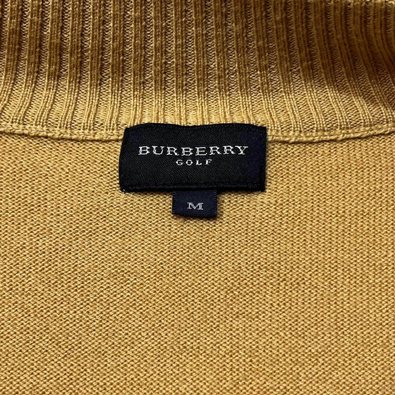 BURBERRY GOLF(バーバリーゴルフ) ノヴァチェックラムウールドライバーズニット/ジップアップ BGT96-761-50 M ベージュ 三陽商会タグ